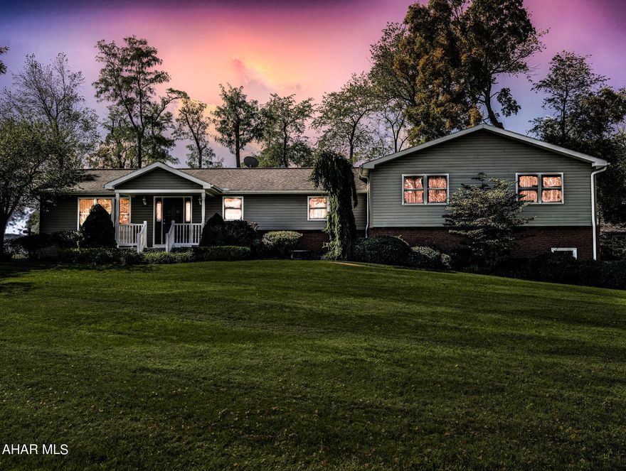 360 degree view of the mountains make this a one of a kind property. This picturesque property comes with a fantastic pavilion complete with stone fire pit, electric, instant hot water tank, wet bar, and an attached work shop/garage. This meticulously maintained home has mature foliage, cement driveway, dog kennel, and a 2 car heated, integral garage with 10 foot high insulated garage doors with openers.  Private back patio that leads into the large open kitchen.  The open kitchen is great for entertaining large crowds and overlooks the beautiful back yard.  Main bedroom has large walk-in closet, sitting area, and full bath complete with soaking tub and large standup shower.  There are radiant heated floors though out the house with additional mini splits for air conditioning and secondary heat source. Other great features of this home are the first floor laundry with secondary laundry/full bath in basement, large great room in basement, basement bedroom/office with cedar closet, heated basement work shop, and so much more.  Close to Buchanan state forest, sweet root park picnic area, Shawnee state park, Rocky Gap, Koon Lake, and only 15 minutes to Bedford.