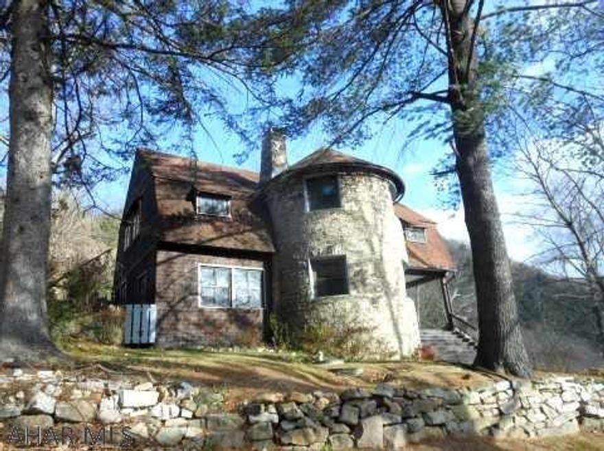 This is a Fannie Mae Homepath property. This is a two story home in Point View Cottage Association. The exterior of home is stone and shake siding. Uniquely styled home located a quiet area. The first floor features a living room, dining room, kitchen and laundry room. The second floor has four bedrooms and two full baths. With a custom touch, make this house your home.  Association $50/month or $600/year.