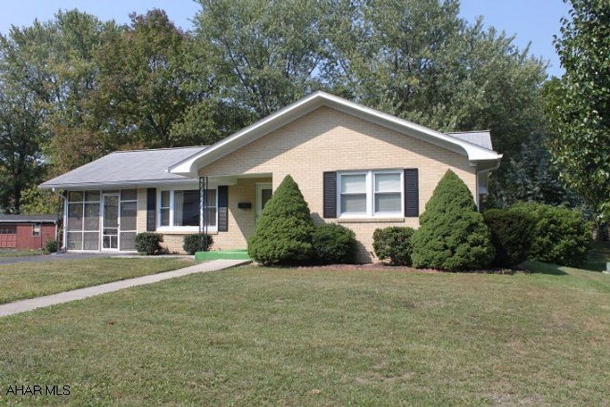 2 bedroom brick ranch in quiet neighborhood, prestine hard-wood flooring throughout the main floor with two large bedrooms that feature full-double closets in both.  Front-room living room is bright and comfortable with large newer windows throughout the house.  Main-floor and basement laundry hookups, an open floor-plan and extra bathroom in the  full basement.  15x9 shed has electric and lighting installed already.  Grass alley-way behind property provides great access for gardening and convenience.  Behind property is a wooded lot.