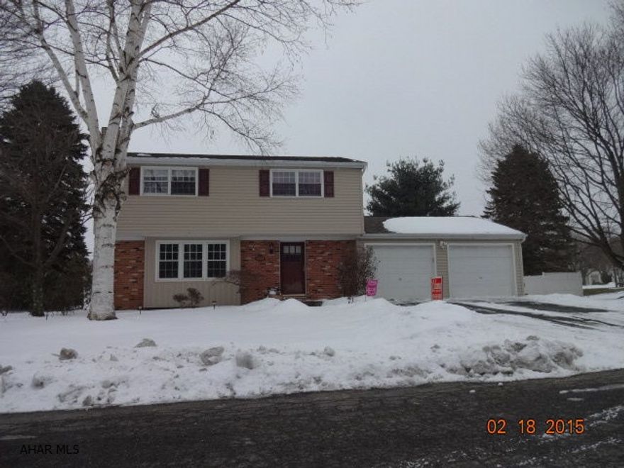 Look no further, this house has it all! Stay warm this winter by the fireplace or watch the game in the finished basement with wet bar. When warm weather comes this house has a large back yard with privacy fence, in-ground heated pool and patio area. Oversized two car garage with newly insulated ceiling and insulation panels on garage doors.
