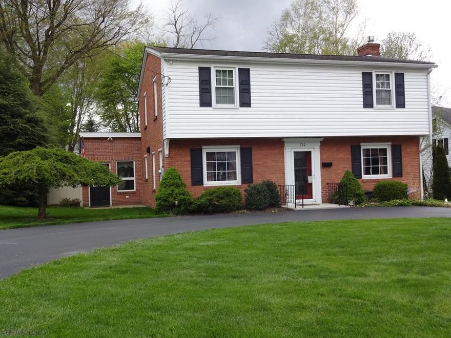 QUALITY- Huge Fr opens to a beautifully landscaped private backyard. LR enjoys fireplace  built-in shelving & Louvered doors. The Kit is newer with bar seating. Basement offers big FR w/wet bar, laundry room and 2 additional rooms that would make a great office or study.