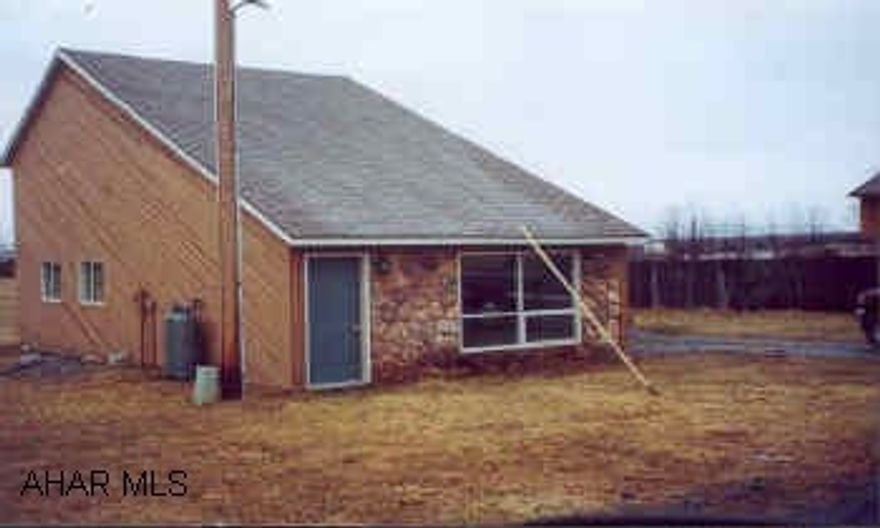 New floor covers throughout, fresh paint inside and out, finished garage. Shared well