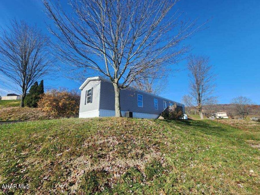 Superb 2020 Eagle River includes central air and new propane. Exceptional quality with ample natural light throughout, and solid craftmanship. $335/mo. lot rent includes trash removal.