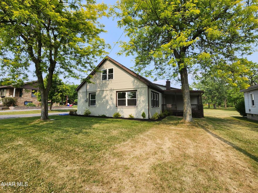Take a look at this BEAUTIFUL remodel, in Hollidaysburg School District. This three bedroom two bath home sitting on just over half an acre is ready for a new owner. The first floor offers a kitchen with new SS appliances, a living room, a dining room, an entertainment room with a fireplace, a primary bedroom with a full bath, a utility room with laundry, and a main floor bathroom. Take a closer look at the HIDDEN walk in pantry with shelving. The upper level offers two large bedrooms. There is an inground pool with, a new liner, and vinyl fencing. The side porch offers additional entertaining options. The large oversized two car garage offers a 2nd floor room used for entertaining. The property has top many upgrades to list. All showings must remove shoes. Call listing agent for more information and your private tour.