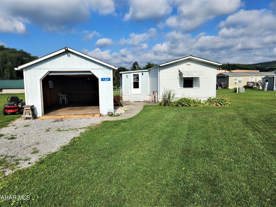 Are you looking for a place to rent with one floor living?  Then come take a look at this home.  It has been well-kept and offers a large yard for outdoor enjoyment.   It features a nice-sized living room and an eat-in kitchen.  The one bedroom is attached to an ensuite full bathroom.  The other bedroom is on the opposite side of the home and has a bathroom beside it. Do you have a pet and  are having trouble finding a rental?  No problem, the landlord will allow one pet in the home.   The month to month lease won't tie you down if you are looking to buy a home and need to move quickly.  Come take a look, this may be your next home sweet home.  Landlord pays for sewage and garabage.  Tenant pays all other utilities. Additional $50 monthy fee and an additional security deposit of $300 for a pet.