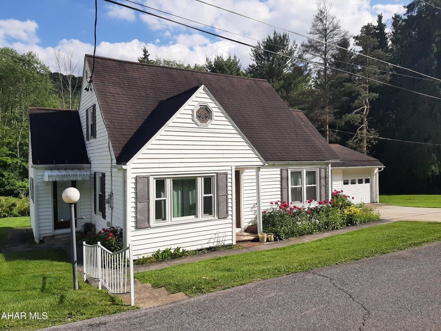 Welcome to this tranquil home in Penn Cambria School District. Boasting 1.7 acres but so close to amenities. This single family home offers four bedrooms and one full bath. Kitchen and dining are connected. Large living room, main floor bedroom, office, and family room with a wood burner. Plenty of newer windows to allow plenty of natural breezes and natural light. The second level offers a cedar closet, two bedrooms and a captive bonus space. Hardwood floors flow throughout this level. Again, great natural light and great breezes. The expansive yard is  waiting for you to put your ''stamp'' on it. Plenty of opportunities for this backyard space. Beautiful perennials all around the house with the sweet smelling rose bushes in the backyard. Call to make this one your own today!!