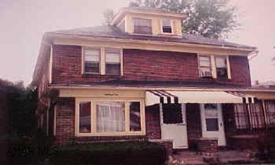 Half of a duplex - home is in nice condition. Extra lot to the back is included. Range and refrigerator DO NOT STAY. The light in the kitchen over the table is being replaced. Third floor could be a fourth bedroom. NO CENTRAL AIR - window unit. Half of a duplex - home is in nice condition. Extra lot to the back is included. Range and refrigerator DO NOT STAY. The light in the kitchen over the table is being replaced. Third floor could be a fourth bedroom. NO CENTRAL AIR - window unit.