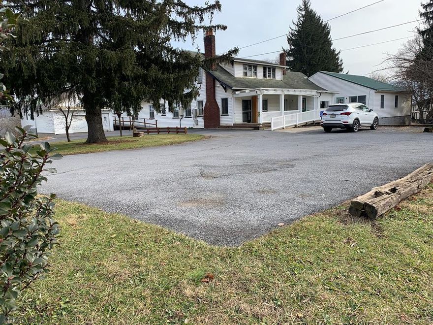 Located just minutes from Historic Downtown Bedford lies a property that offers an investment opportunity with endless possibilities.  20 bedrooms, 13 bathrooms (some 1/2 and some 3/4) and multiple kitchen, living and recreational areas with 9 entrances and exits.  Handicap accessibility, many outdoor living spaces as well as a courtyard are just a few of the many features this well maintained property has to offer.  Many folks in the area will recognize this home as Carrol's Rest Home.  It would make an amazing apartment complex, bed and breakfast, retail and/or office space as it is conveniently located within minutes of I-99.