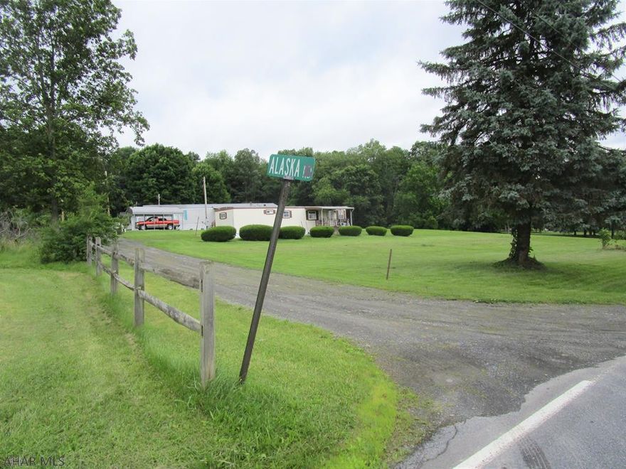 Trailer park - 4 spots (tenants own trailers, sheds &/or carports).  Rent: $195 per month per trailer spot.  Tenants pay separate electric,TV, cable, phone, Internet, trash & mow their lawn areas.  Owner pays public sewer (C.R.A.M.J.A -currently $49/mo./ea.trailer spot), maintains Alaska Rd. (private rd extends from Valley Rd. to Orchard Rd.) & maintains well & well equipment.  B.R.E.C. electric:  5 separate meters (1 for common electric pd. by owner- $50.39 / mo.avg.)  & 1 for each trailer spot paid by tenants).  Small, concrete block water equipment/pump house with portable electric heater for use in cold weather. Current insurance $142+-/year               ****** WHEN WALKING AROUND WELL/PUMP HOUSE...PLEASE BE CAREFUL NOT TO WALK INTO THE THE METAL ROOF OVERHANGS******.