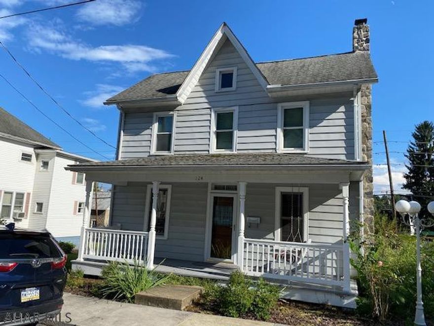 Well kept vinyl sided two story 3 bedroom 1 bath home. this charming home features hardwood floors throughout. Original solid wood doors, oak kitchen, 200 amp service, large front porch and back deck. fenced yard, newer windows and a walk out basement.  conveniently located on a back street in town close to all amenities. off street parking.