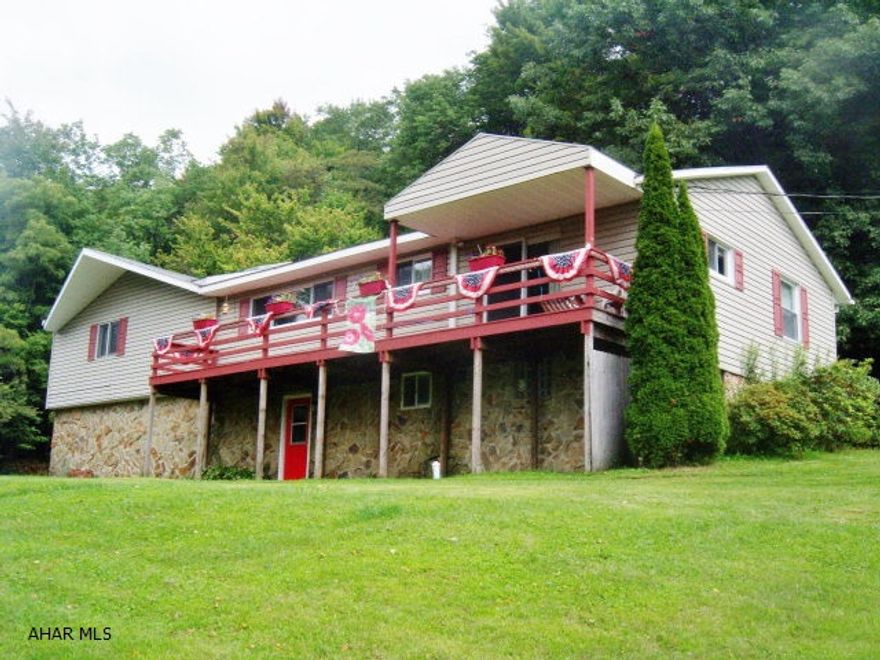 Lovely country setting 2.2 acres, chefs kitchen with new double convection ovens, supplemental heat-pellet stove. Spiral staircase leading from first floor to basement