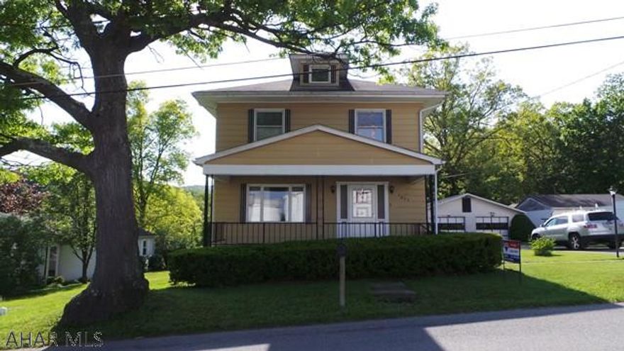 A little dated inside, but what great space! 1.33 acres, 30 x 31--  2 car garage  with large workshop in back. Laundry hook-ups in main level and in basement. 1st Floor has large family room and 3/4 bath.  Taxes are estimated.  Lot size is irregular : 100 x 417 x 267 x 40 x 723.  See documents for plot map.