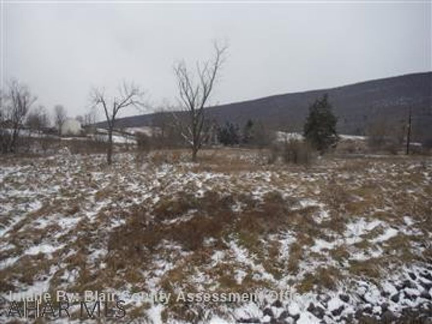 Beautiful level building lot in Countryside Estates.  .83AC, Public Sewer, must drill well.