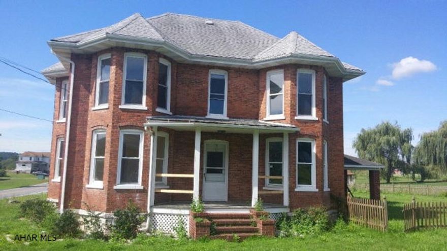 Brick Victorian ready for your TLC. Detached 2 car garage, covered pavilion and fencing. Close to I-99.