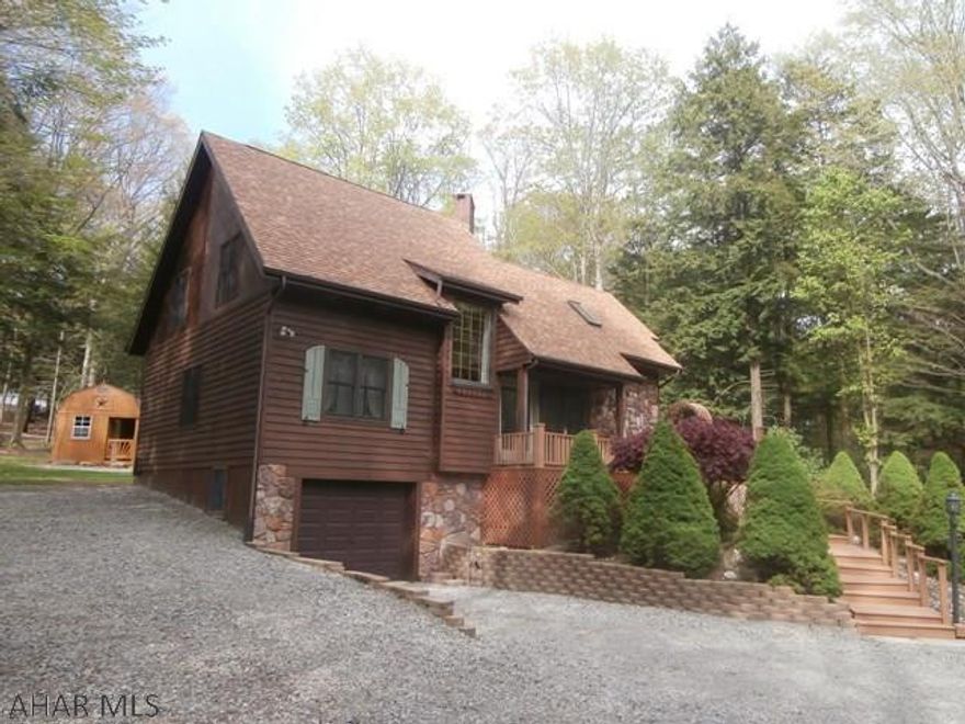 Rare custom built home that appears as new in Glendale Yearound! Hickory kitchen, formal dining room, large living room with cathedral ceiling, first floor master bedroom with bath and make-up room. Finished sunroom. Very clean and well maintained home with second floor 2 bedrooms and 3/4 bath. Full unfinished basement with equipped laundry area. Integral garage. Beautifully landscaped with exterior lighting and parking for a motor home. Large deck and a half acre lot! Seller relocating.