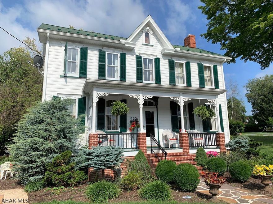 This gorgeous, shuttered two-story has been so very well maintained and nicely updated throughout!! Offering a foyer with open staircase, LR w/ pine floors, DR with w/ crown molding & chair rail, & a kitchen w/ oak cabinets, large central island & glass-face oak built-in cabinet. Second level with 3-beds, den (could be a 4th bed), beautifully updated & tiled bath, and a sun porch. Natural gas HW heat, partial bsmt, and a walk-up attic. Large street to alley lot, paver driveway, serene landscaping, stone patio, & concrete & stone walks. Brick & wood columned front porch, original round top windows & light transoms. Close to amenities, a short walk to the downtown area, Heritage Trail, Bedford Elks Country Club and the Omni Bedford Springs Resort. This remarkable home is move-in ready!!