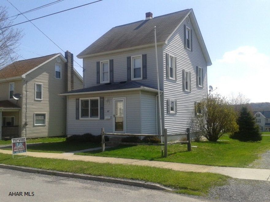 There is classic, original oak trim throughout this 3 bedroom, 1.75 bath, 2 story home in a quiet neighborhood. All vinyl thermopane windows, new front door & storm door, new countertops, dishwasher & refrigerator. Enlarged master bedroom has walk-in closet & sitting area. Bonus room/office on first floor has a large closet. Covered back porch has new decking & overlooks the large, flat yard. Off-street parking.