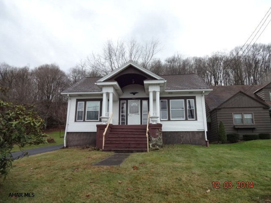 Adorable Cape Cod Saxton home on nice lot. Nice hardwood floors, vinyl siding, 1 car detached garage, covered rear patio. Being sold AS-IS. Seller will make no repairs.