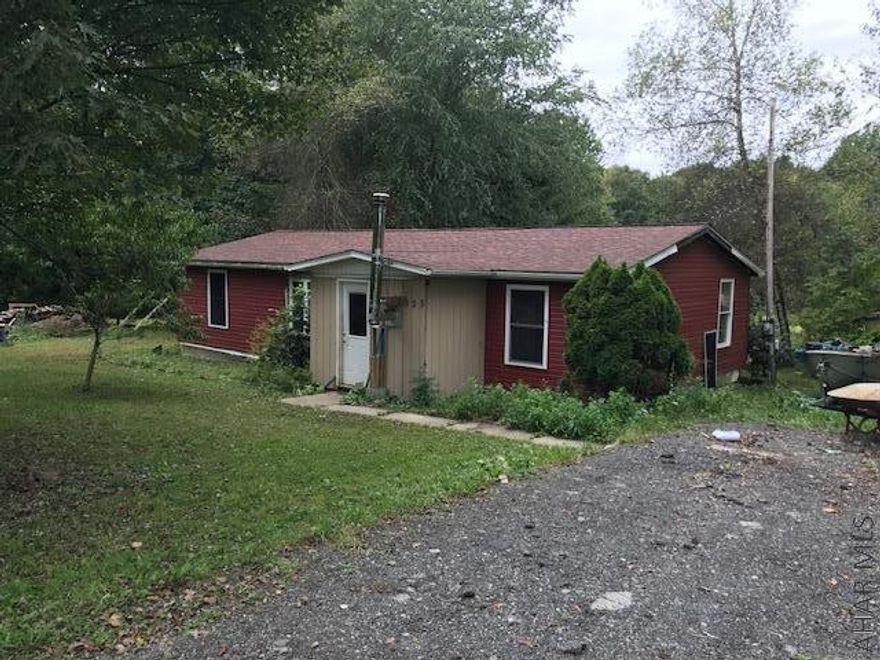 Great location in a private setting!  2/ 3 bedrooms with a shed and above ground pool.    Recently rented for $500 / month.  Coal/ wood stove combination.  Tons of potential!!!  Make your appointment to see it today. Owner will not pay for  any repairs.