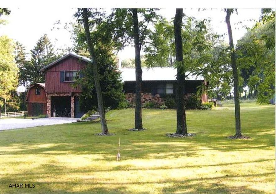 This beautiful raised ranch home is nestled in the mountains near New Enterprise in the NBC School District.  This 1 acre lot allows for family fun and privacy.  This house is a must see with 4 bedrooms, 2  bathrooms, family room with woodburning fireplace, and  2 car garage.  Rooms are spacious and plenty of storage.