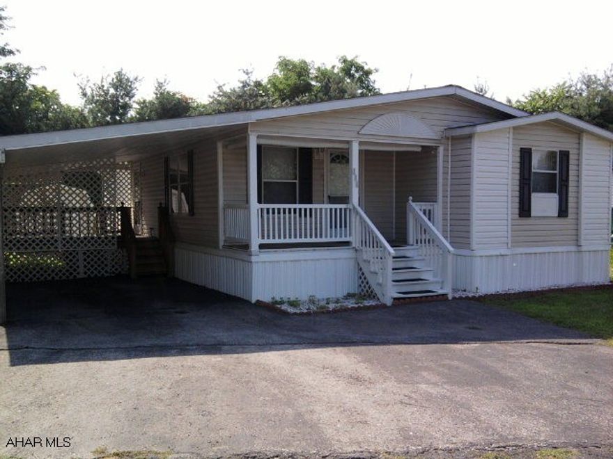 Well maintained home in a relaxing setting.  This home offers 3 bedrooms and 2 full bathrooms with Central Air.  The master bedroom has a walk-in closet, full bathroom and ceiling fan.  The kitchen has a new refrigerator and sliding doors to the 4' x 9' side porch.  It also features a 11'10 x 11'6 covered deck, to be enjoyed in any weather.  Other amentities include a 12'5 x 4'6 covered porch, Carport and a 8' x 12' shed.  Walking distance to strip mall and restaurants.  Lot rent of $368 includes water, trash and snow removal.  Price reduced to $35,000 or best offer!