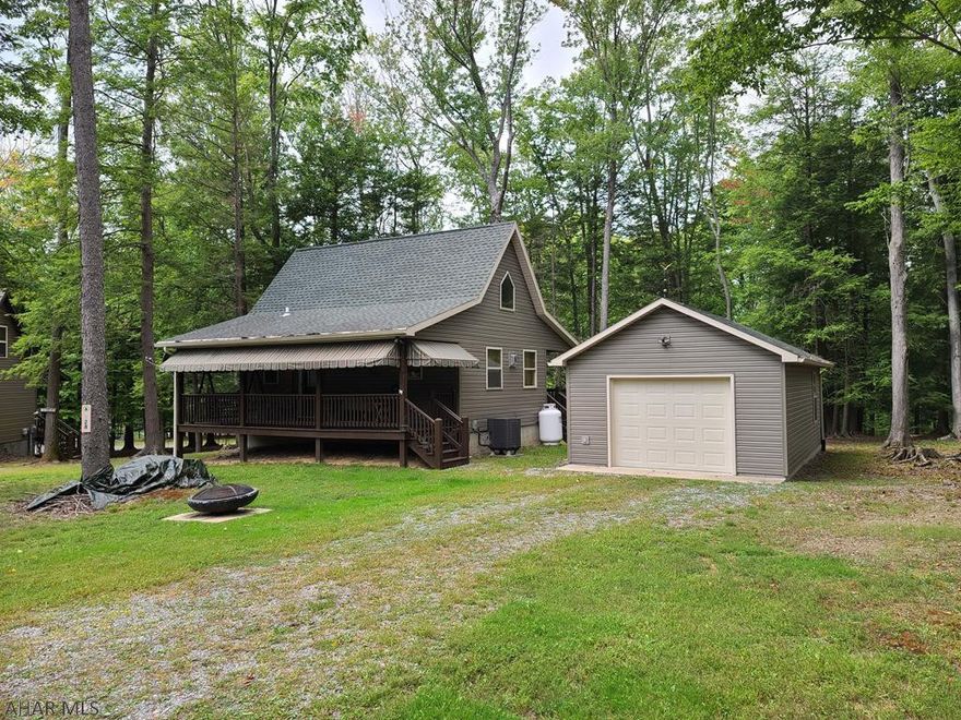 Beautiful, cozy, cabin for sale on 1 lot in Glendale Yearound. This cabin has 1 bedroom on the first floor with a loft bedroom on the second floor. Kitchen/living room and bathroom complete the main floor. There is a small propane stove for extra heat when its