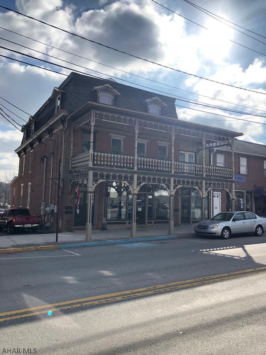 Retail/Restaurant on main floor.  3rd floor with two 1 bedroom apartments.  Second floor mostly finished into a very large 2 bedroom apartment.