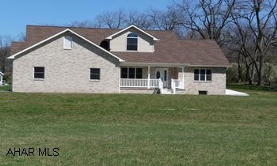 Beautiful new 1 1/2 Story Brick/Vinyl home situated on 2 acres. New Cape Cod with vinyl / brick facade beautifully sited on 2.02 acres. Tiled foyer, light and airy spirit, large rooms, private first floor master suite with jacuzzi and walk-in closet. 3BR/2 full and 2  half luxurious baths, formal dining room, Pella windows, central heat/air, central vaccuum system. Kitchen with oak cabinets and kitchen appliances included, French doors leading to back deck, Great Room with hardwood floors. Attached 2-car garage*recessed lighting*covered front porch*mountain views*underground utilities*deed restrictions and covenants apply.