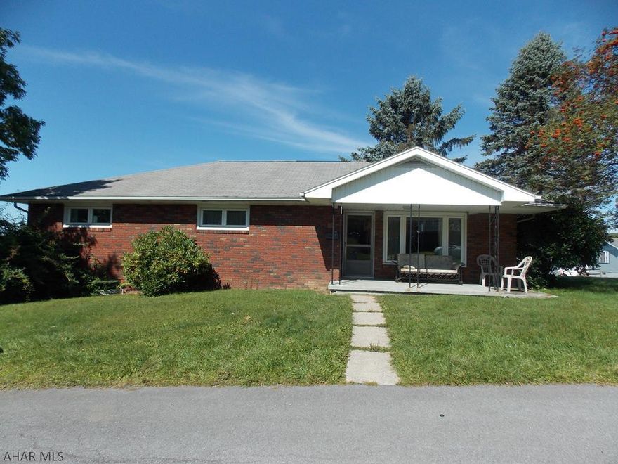 Solid brick ranch home in Gallitzin Borough.  Newer windows and roof and the water heater was just replaced.  Laundry is on the first floor but original plans were for that space to be a master bath. The basement is an open slate to be finished as a huge family room and still have room for a two car garage. Needs so TLC but is a great family home. This home is on a nice corner lot in a lovely neighborhood in Gallitzin Borough.