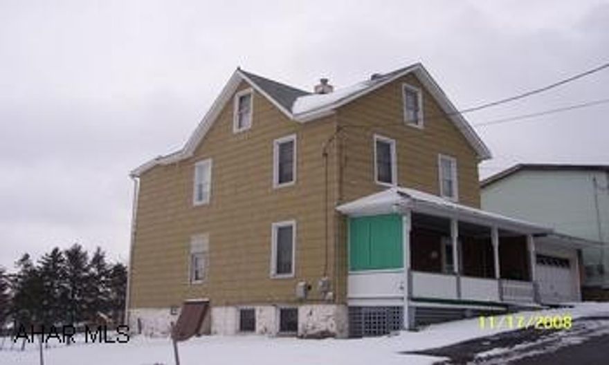 2 story home with newer roof. windows, wiring, and furnace.  Walkup attic, floored.