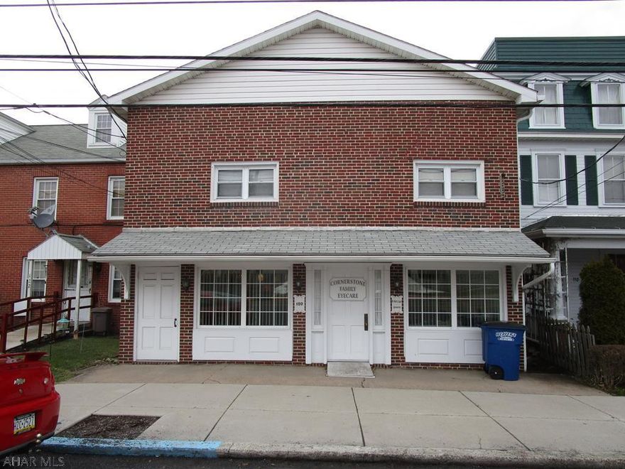 Professional office building with large second level apartment in downtown Bedford!!  Just steps from the Bedford County Courthouse, the square, other professional offices, restaurants & shops.  First level was used for professional office space with a waiting room and reception area, five offices and two half baths.  Second level apartment has a living room, kitchen, 3-bedrooms, laundry room and a full bathroom.  Partial walk-out basement.  Oil forced air and oil hot water heat and central air conditioning.  Electric is separated, water and sewer are metered together.  Office space and apartment are nicely updated and the building is very well maintained.  Great in-town location!!!