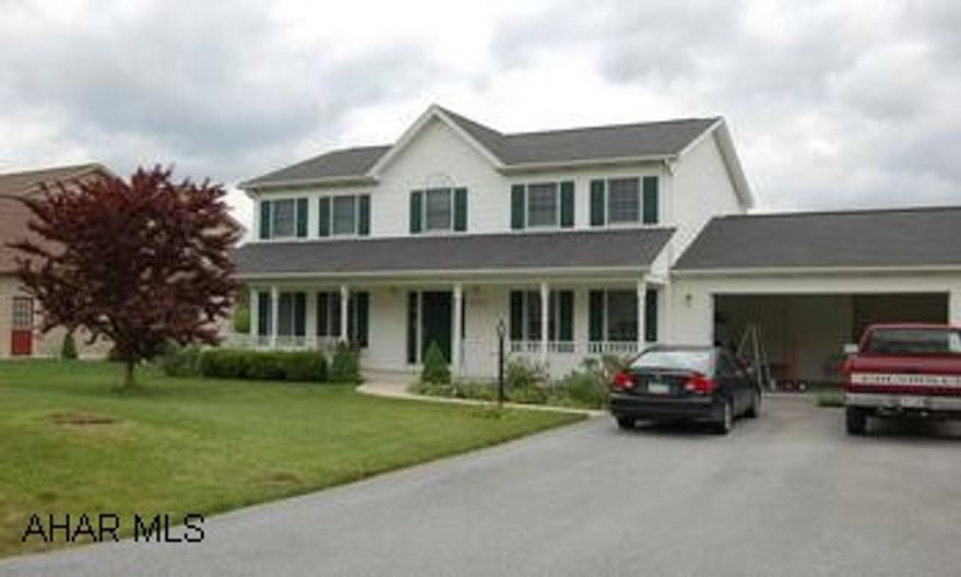 large unfinished basement plumbed for bath, housed plumbed for central vac. all on a quiet street 2 story , 4 bedroom Colonial home. 2 1/2 bath, large deck in back, cherry cabinetry in kitchen, spacious rooms, lovely open front poch, attached garage, gas fireplace in the family room, vegetable garden, ready for central vac. basement plumbed for 1/2 bath. home built by Mark Metz