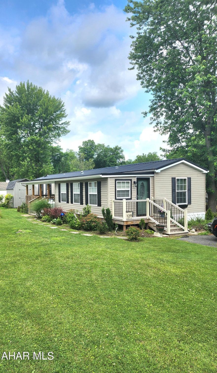 Welcome to Friendship Village, a 55+ community, where comfortable living meets convenience. This charming 14x70 Champion single-wide manufactured home is ready to become your new home. With its desirable features and numerous renovations, this property offers a delightful living experience.

As you step inside, you'll be greeted by an inviting open-concept layout that encompasses a spacious living area, a beautiful kitchen, and a dining space. The kitchen has been thoughtfully updated and boasts modern appliances, ample cabinetry, and a stylish aesthetic.

This home offers two bedrooms, providing comfortable space for you and your guests. The primary bedroom features its own private bathroom, offering convenience and privacy. Additionally, there is another well-appointed bathroom to accommodate your needs.

One of the highlights of this property is the four-season sunroom, where you can relax and soak in the natural light throughout the year. Step outside onto the covered porch, perfect for enjoying a morning cup of coffee or evening conversations with neighbors. The beautiful landscaping adds to the appeal and creates a serene outdoor oasis.

For added convenience, this home includes a storage shed, allowing you to keep your belongings organized and easily accessible.

Numerous upgrades have been made to this home, including a heat pump that ensures comfort year-round and laminate flooring throughout, combining durability and aesthetic appeal.

Friendship Village offers a welcoming community environment for residents aged 55 and above. The lot rent is $285.00 per month and includes trash services, providing hassle-free living. Please note that there is a $100 application fee.

Don't miss out on this fantastic opportunity to own a beautifully renovated home in the desirable Friendship Village community. Contact us today to schedule a viewing and make this wonderful property your own. Enjoy the activities offered at Friendship Village, including miniature golf, fishing, swimming, and seasonal entertainment, adding even more enjoyment to your vibrant lifestyle.