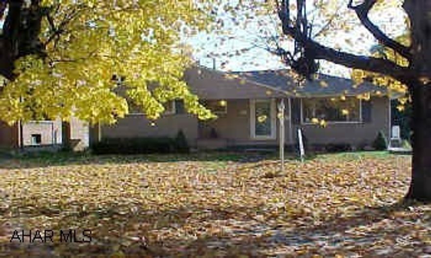 Nice ranch home with hardwood floors- move right in, carport in rear alley Very nice ranch home with lovely hardwood floors,all applianced included,huge full basement,carport and nice covered patio.  Newer roof  and siding and C/A.Immaculate condition.