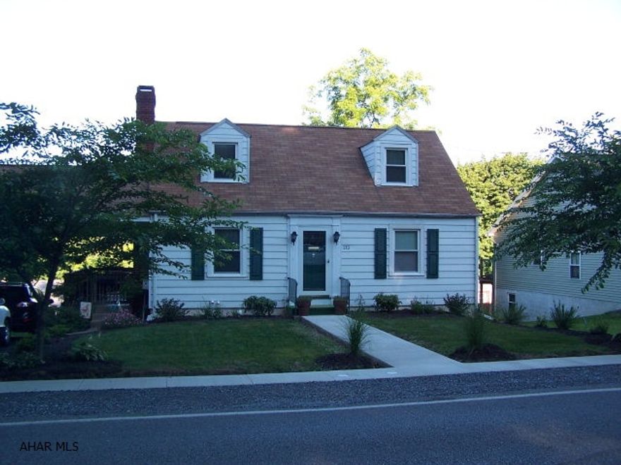 This well maintained  Cape Cod style home is a must see! It has been completely updated and is move in ready! The colors are modern and flow well from one room to the next. Nice kitchen with small eat in area and lots of room. The Dining room has warm colors, hardwood floors and a wood burning fireplace for cozy dinners on cold winter nights. The bedrooms are all roomy and inviting. The large covered deck is a perfect spot to sit and sip your morning coffee and look at the beautiful view. There are just too  many amenities to list.