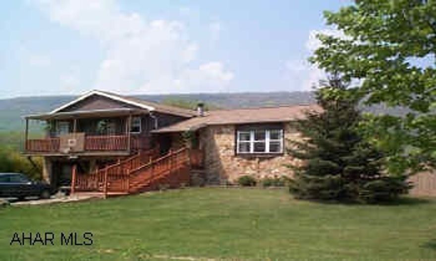 Very nice 3 Bedroom, 2 Bath on large lot, decking, hot tub, 2 wood burners. Attractive home on 3/4 acre. Covered deck, hot tub with privacy fencing, new vinyl siding and windows, pond, storage shed.