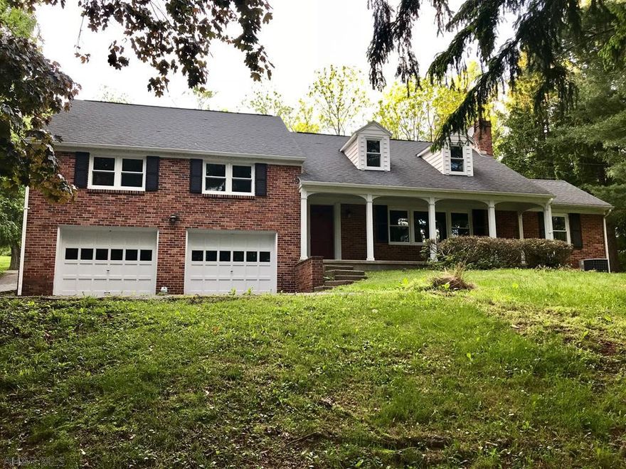 Opportunities like this don't come along often, so don't miss out on this well built brick home in the Taylor Highlands development. This home is located on a quiet street with mature trees and is located near the college and area schools. Enjoy spacious rooms, loads of closet space and that character and charm that makes it stand out from the others. You'll love the large bedroom with hardwood floors on the third level with partially exposed brick wall, two dormers, walk in closet and wall storage. There is plenty of outdoor space for entertaining with paved driveway in front and behind the home providing ample parking for your guests and a place to shoot hoop