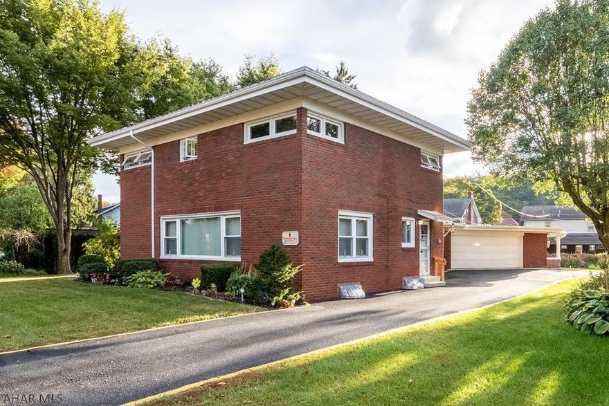 A PLACE WITH SPACE! THE PLACE TO START IS HERE! This 4 bedroom home with large living room, wood f/p, large office plus additional room for family/guest entertainment. Basement is finished with bar area. 2 car oversize garage and door leading to covered patio. Always wanted to work from home, this is a perfect opportunity for that dream to come true. Driveway will accommodate multiple parking spaces. Needs some updates but many possibilities. MANSION PARK area.