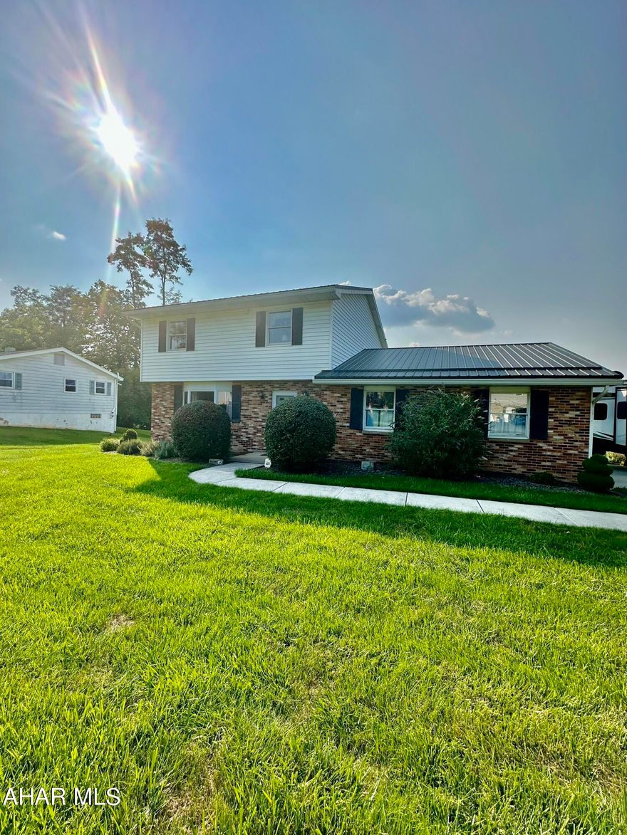 Meticulously & Beautifully maintained two story in Rolling Hills boasts three bedrooms and two baths. First floor family room with beamed ceiling, brick woodburning fireplace & open to the oak kitchen with a cozy island. The spacious living room and Dining room finish the first floor living area. The lower level offers a second family room, laundry room, kitchen area, & lots of storage. One car attached garage with storage area. Flat pristine yard with a patio area in the back (gazebo included) This home has so much to offer! Please see the attached page of House Project dates with the sellers disclosure for the updates on this home.