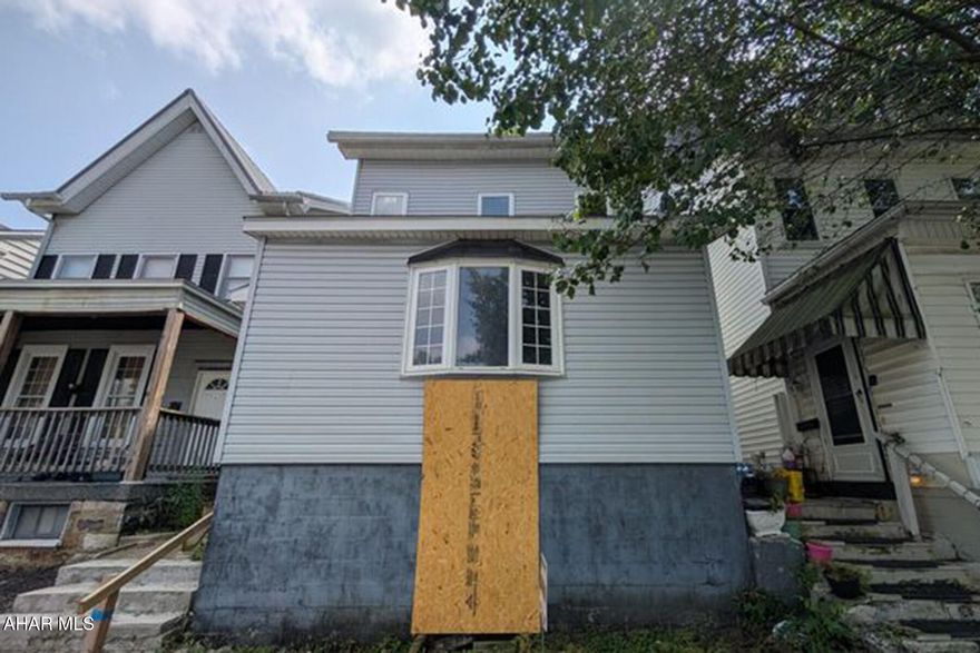 Investor special with over 2,000 square feet ready for transformation. This 3-bedroom, 1-bath, two-story home in Altoona offers a spacious footprint with 2,021 interior square feet on a compact 0.07-acre lot. Built in 1920, the property is currently gutted and requires full interior renovation. Many interior walls are down to the studs and in need of significant repairs which may include, but not limited to electrical, plumbing, walls, flooring, and mechanicals. This is a true as-is sale: seller will make no repairs, offer no credits, and will not be cleaning out the property. Utilities are not on for inspections. The opportunity lies in the layout, square footage, and potential for value-add improvements. This property is not currently habitable in its present condition and is best suited for experienced investors or rehab professionals. Seller is a licensed real estate agent in the state of New York.