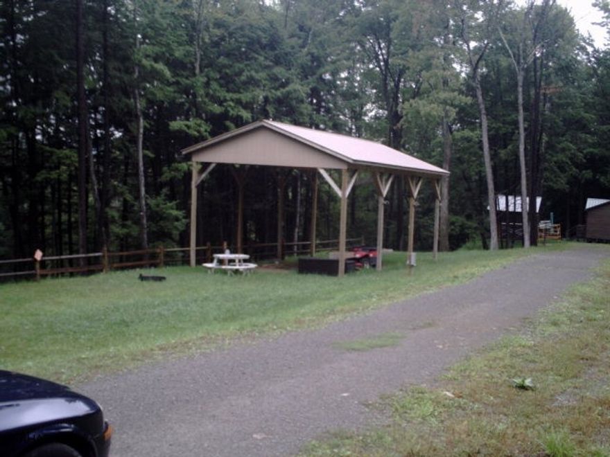 Large double camp lot in Glendale Year Around complete with pavilion, water sewer, electric and great view.