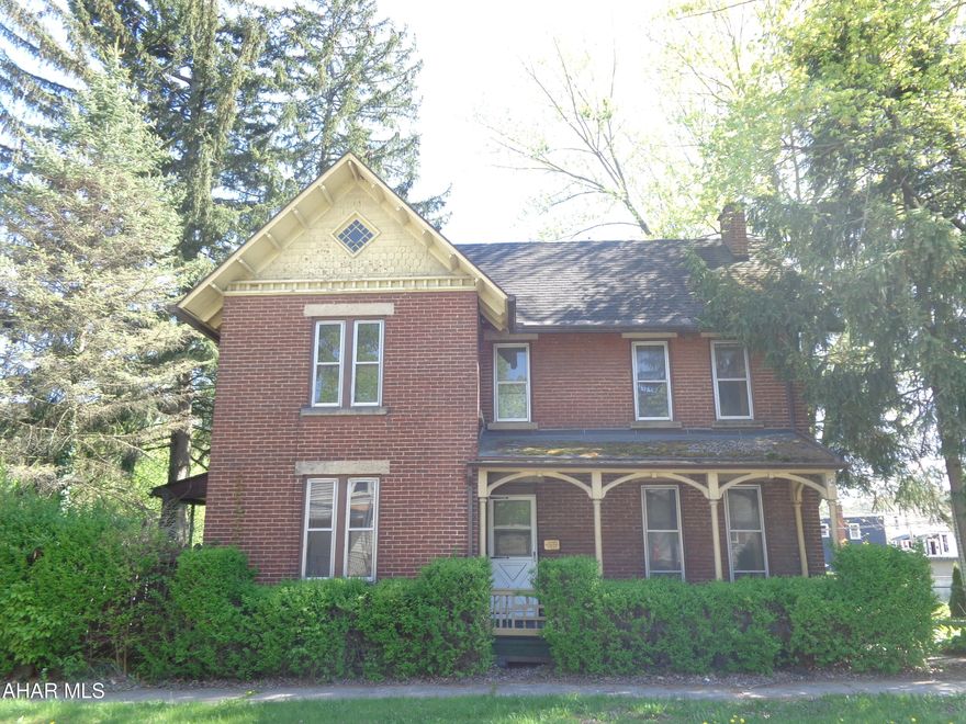 In the heart of Hollidaysburg is a CIRCA 1890 home that needs some love and attention.  This brick home has spacious rooms, original woodwork, stained glass windows & a beautiful staircase.  There is a garage, shed, deck, carport and a large, level backyard.