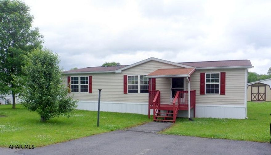 1999 Doublewide - Duncansville - 3 Br, 2BA with skylights. Living Room with vaulted ceiling. Eat-in Kitchen with breakfast bar and appliances, laundry includes washer and dryer, Master BR has walk-in closet, luxurious master BA offers a Jacuzzi tub, separate shower, linen cupboard, and double sink, central air, rear screened porch, shed with ramp on large lot 85 x 160. Updates include: New skirting, porch screen, paint, fan, and carpet. Interior cleaned spotless! Just move in! $49,900