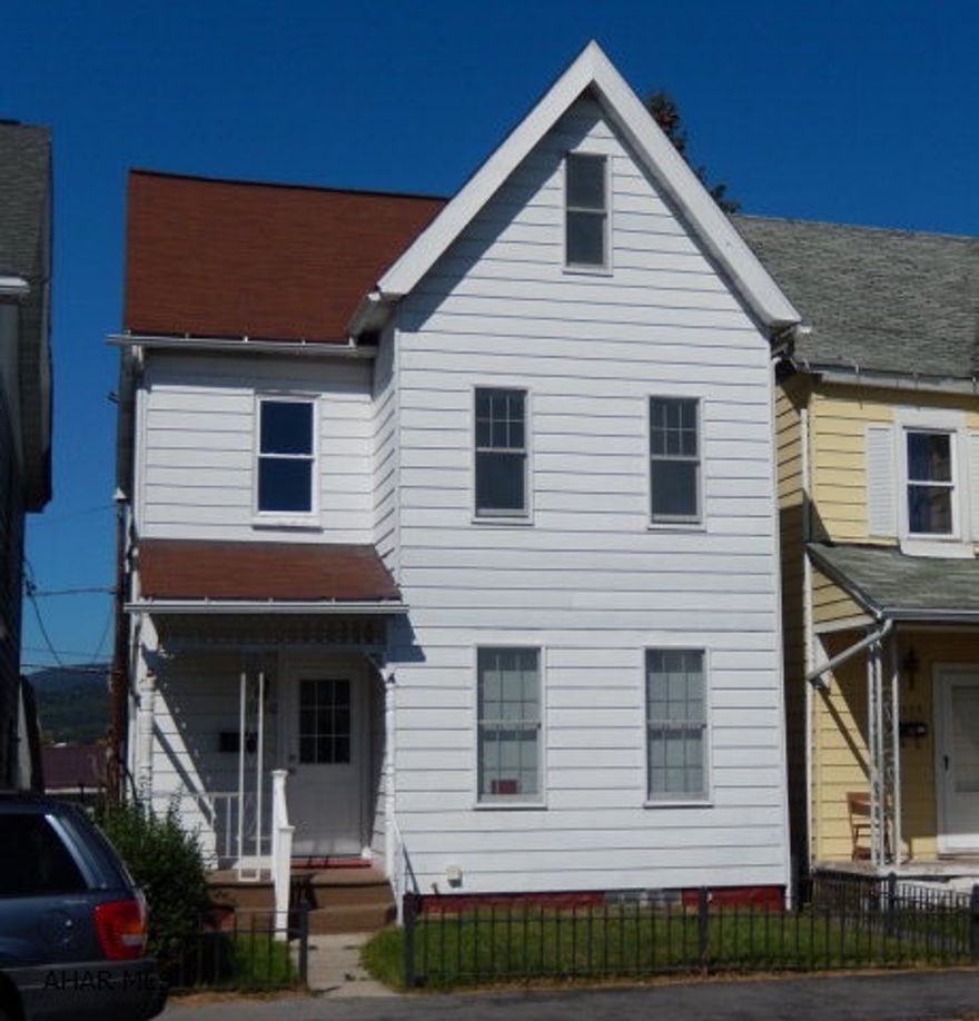 Cute 2 story features 3-4 Bedrooms and  1 3/4 baths. Fenced front and back yards.  Eat-in kitchen. New carpet and freshly painted through out.  Original stairway. Finished attic without heat.  This house is priced to sell.