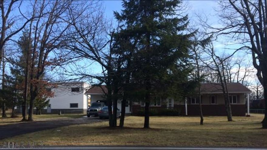 GREAT RESIDENTIAL AND/OR COMMERCIAL!  1.2 ac.Walk to State Game Lands! Only 5 mi from Penn State Altoona Campus, UPMC Altoona Hospital or downtown Altoona!  Less than 15 min to Glendale Lake! Sprawling 4 bed 2 bath ranch has a large 2 tier deck and level fenced yard. Attached 1+ car PLUS detached 6000 sq ft 2 story garage (on separate deeded lot) with high doors on 3 sides allow great auto and toy storage, business, or horse barn! Garage has a lift, bathroom and 2 offices. Home has newer wood burner, efficient heat pump/central air, 2 fireplaces, new water heater, Jacuzzi tub, light and fan fixtures, carpeting.  Perfect for hunter, sportsman, car buff, business owner or family that wants to be out yet near.  Most value on house and land. Home Inspection on file. Good well and septic.