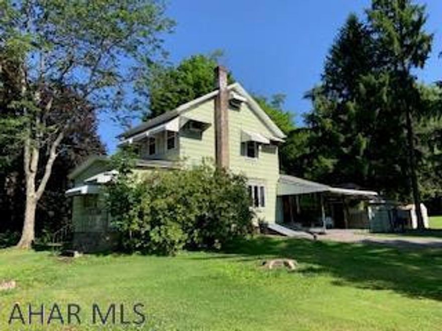 Where can you find a 2-3 bedroom 1 1/2 bath home with approximately 9 beautiful acres on the edge of Altoona!  Allegheny Township.  Hollidaysburg schools.  This home has improvements of attractive kitchen and dining room bamboo floors.  Updated bath.   Newer well.  Add your touch and improvements.  Enjoy the woods.  Consider the uses of this property.  Call listing agent for your viewing.