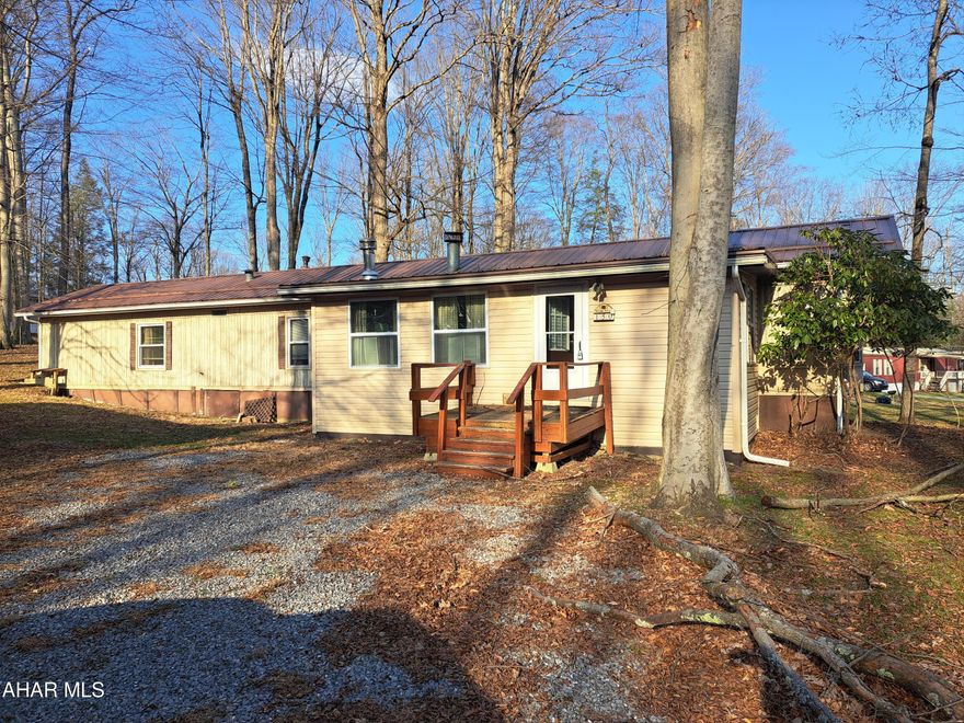 If spacious rooms and peaceful surroundings are what you're looking for, this property deserves a look. This 2-bedroom, 2-bath home offers an open floor plan between the kitchen and living room, creating a comfortable space for everyday living and entertaining. The large sunroom adds even more room to relax and enjoy the natural setting, while the gas fireplace in the living room helps keep things cozy on cool evenings.

The primary bedroom features French doors leading to its own private bath, and both bedrooms offer generous space. Outside, you'll appreciate the partially fenced yard, detached one-car garage, and the quiet setting within a gated community.

Located just minutes from Glendale Lake, the area is known for its abundant wildlife and peaceful surroundings -- deer are frequent visitors to the yard. Whether you're looking for a weekend getaway or a year-round home near the lake, this property offers comfort, privacy, and access to outdoor recreation.