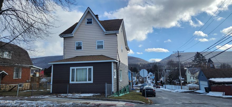 If you want space you got it here in this well maintained large older home in nice area.  Off street parking and oversized garage large enough for 2 cars.  4 spacious berooms with ample closet space.  Walk up attic could be used as a 5th bedroom.  Living room, family room and eat in kitchen.  Closed in front porch could be used as an office space.  Basement can be used as man cave or extra living space as it has stove, fridge, microwave and bathroom.  Also this beautiful home comes sided and has a nice fenced yard on corner lot!
Call today to schedule your showing.