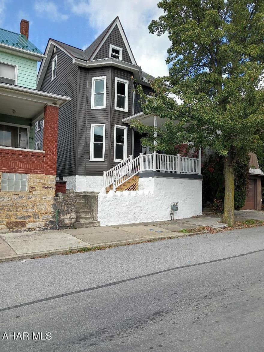 Beautiful completely remolded 3 bedroom 2 story home. New windows, roof, siding, new furnace with central air conditioning. All walls and floors have been replaced like walking into a new home. Kitchen dinning area and living room show a  wide open concept. You will want to live in the extra large bathroom with a beautiful shower and jet bathtub. Laundry room just off the bath makes doing laundry a pleasure. Call to view the home will not last long.