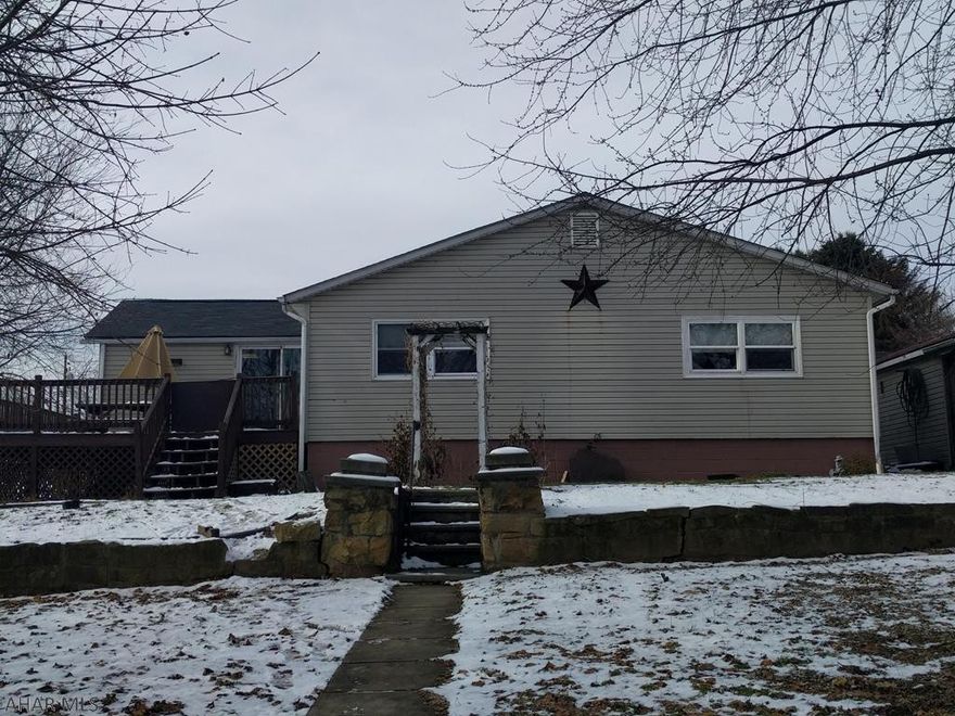 New Price! 1-Story, 3 BR home in Daisytown Boro, with wrap-around deck and fenced-in yard.  Home has a detached garage and an additional garage/carport 18x20 in back of house for extra cars or storage. Large lot 100x120, and ramp for easy access into house. Oil Heat